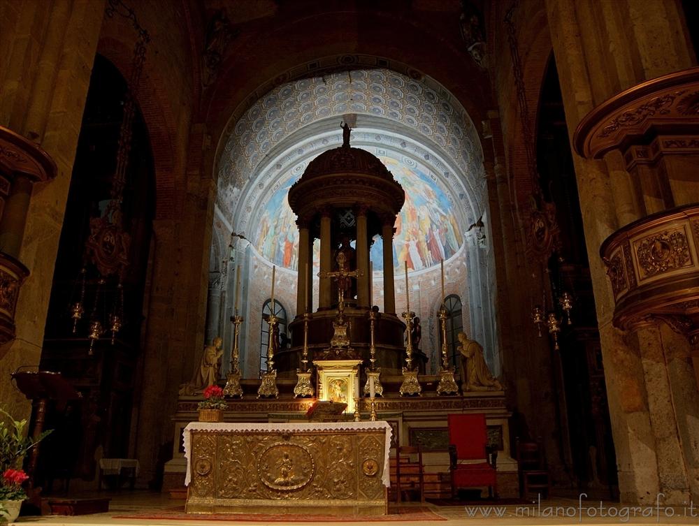 Milan (Italy) - Basilica of San Simpliciano by night: altar and aps